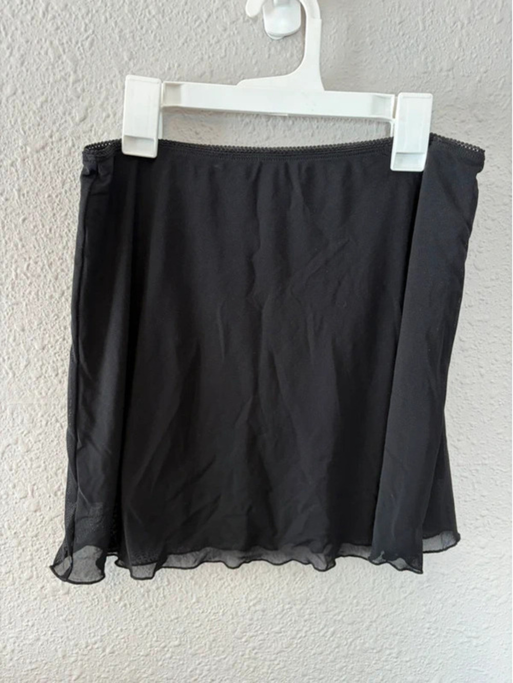 John Galt black mini skirt. O/S. 13in waist and stretchy. Best for M
